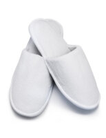Luxuriöse Hotel Slipper aus weißem...