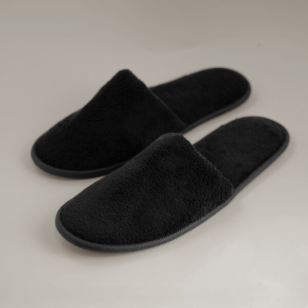Black closed hotel slippers made of soft nonwoven fabric with a non-slip sole, 30 cm